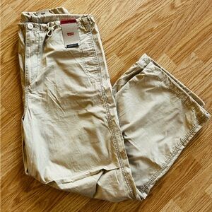 Women’s Levi  khaki parachute pants. Brand new with tag. Size small.